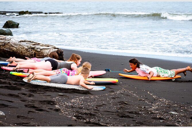 Big Island Surf Lesson from Hilo - Meeting at 74 Kamehameha Ave and getting your rash guard on