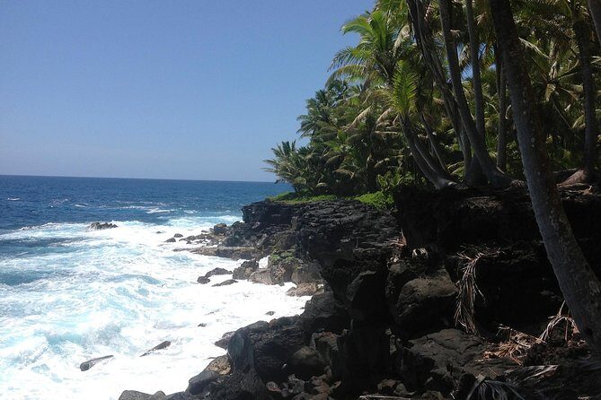 Kilauea Summit to Shore from Kona: Small Group - Hilo stop: Kaumana Caves and Waianuenue (Rainbow Falls)