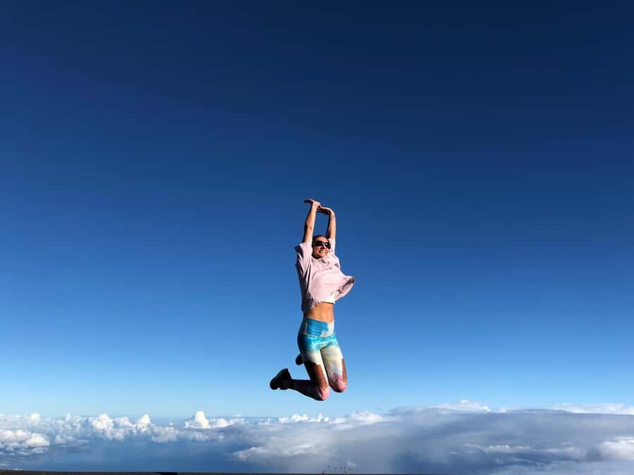Maui: Haleakala Sunset Tour with Snacks and Photos - Summit sunset and the sky-jump photos: warmth, timing, and where to stand